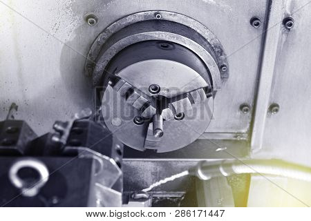 Spindle Chuck And Installed Metal Part On High Precision Cnc Industrial Lathe Turning Machine. Close