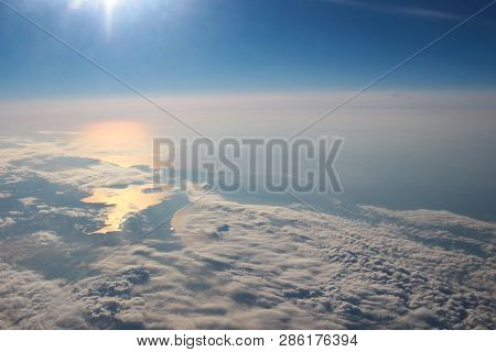 View Above The Earth At The Clouds Below