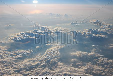 View Above The Earth At The Clouds Below