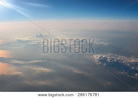 View Above The Earth At The Clouds Below