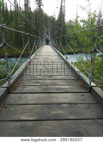 Bridge In Suspension Of Wood In The Mountain