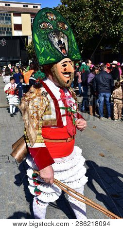 Verin, Spain, 24 Feb 2019. Famous Carnival And Street Parade With Cigarrons Costumes. Ourense Provin