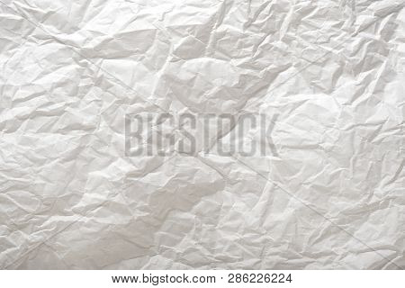 White Paper Wrinkled Texture For Background And Copy-space. Crumpled Parchment Or Baking Paper For B