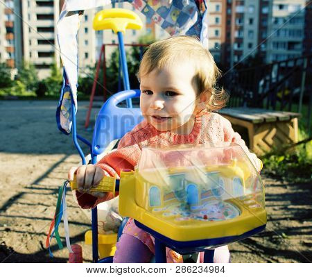 Little Girl Outside Walking At Playgarden, Lifestyle People Concept