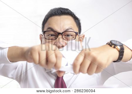Angry Businessman Rip Off Contract Paper