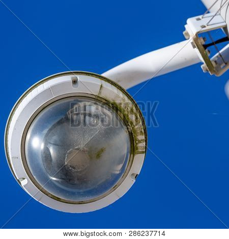 Closeup On Cctv Camera Under Blue Sky Seaside For The Safety Of Tourists