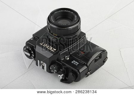 Moscow, Russia, February 26, 2019. The Old Soviet 35 Mm Slr Camera Zenit 122, Released 1993, On Gray
