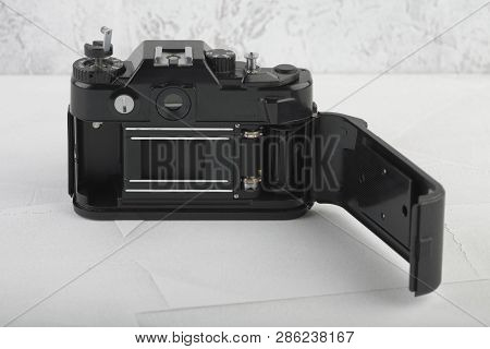 Moscow, Russia, February 26, 2019. The Old Soviet 35 Mm Slr Camera Zenit 122, Released 1993, On Gray