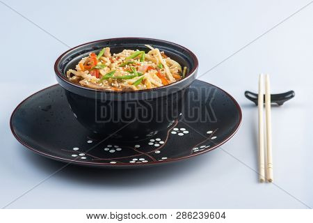 Japanese Ramen Soup With Chicken, Egg, Chives And Sprout On Dark Wooden Background.