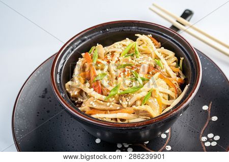 Japanese Ramen Soup With Chicken, Egg, Chives And Sprout On Dark Wooden Background.