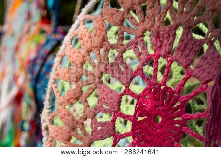 Dream Catcher Made Of Handmade Colors Hanging In The Sun And Moved By The Wind. Typical Handicrafts 