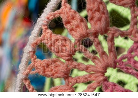 Dream Catcher Made Of Handmade Colors Hanging In The Sun And Moved By The Wind. Typical Handicrafts 