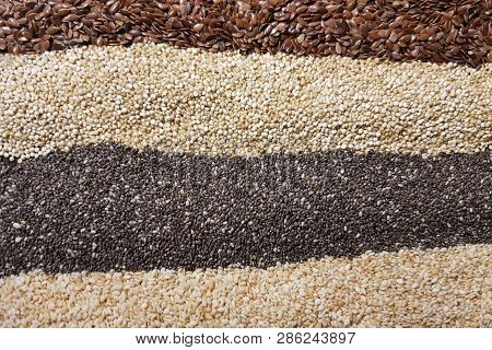 Healthy Superfood: Flax Seeds, Chia Seeds And Quinoa Seeds Close-up.