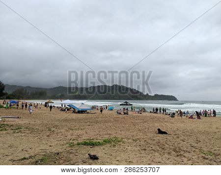 Hanalei, Kauai - April 7, 2018:  People Hang Out On Hanalei Beach With Tents During Surf Contest.
