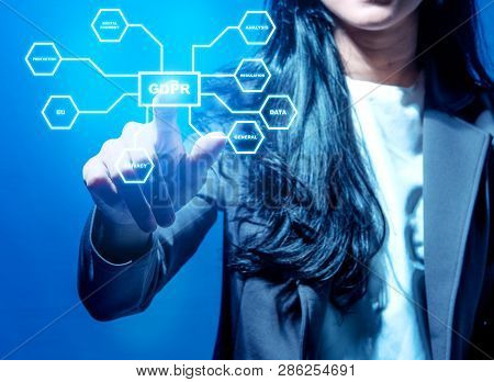 Hand Of Business Woman Pointing At Gdpr Button With Protection Structure On Virtual Screen. Cyber Se