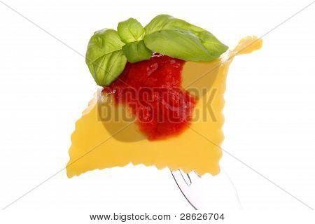 italian raviolo whit tomato sausages end basil