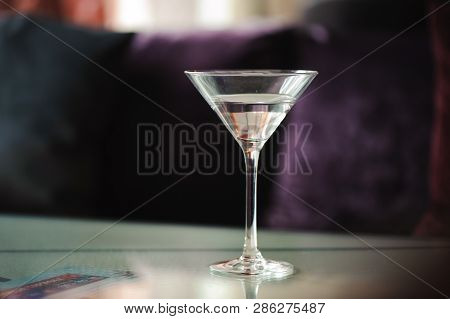 Glass Of Matini. Vermouth Cocktail On The Table.