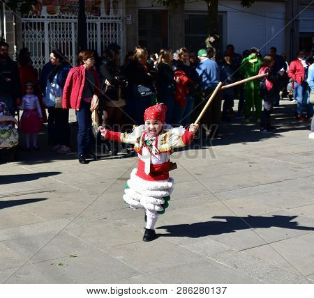 Verin, Spain, 24 Feb 2019. Famous Carnival And Street Parade With Cigarrons Costumes. Ourense Provin