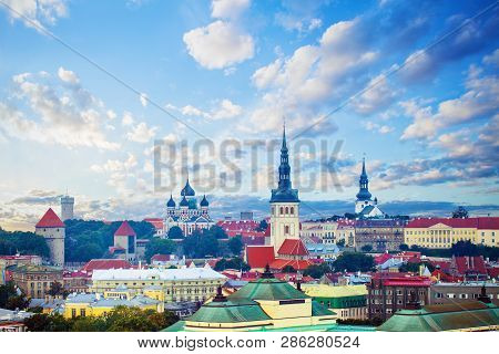 Tallinn, Estonia. Cityscape Skyline Of Old Town Of Touristic City Tallinn. Red Roofs And Colorful Cl