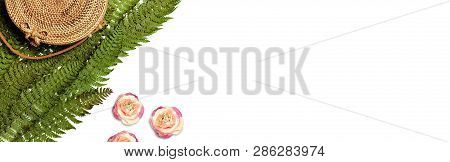 Fashionable Handmade Natural Organic Rattan Bag And Green Fern Leaves, Pink Flower Isolated On White