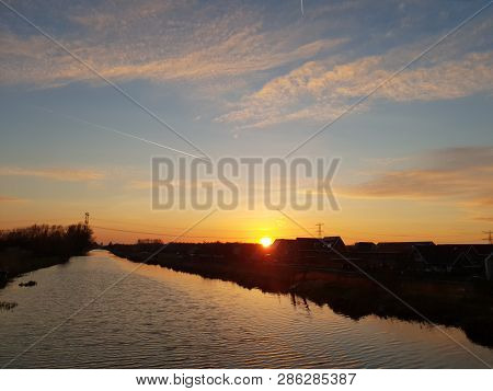 Sunset Over The Ring Canal Along The Bermweg In Nieuwerkerk Aan Den Ijssel In The Netherlands