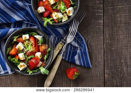 Vegetarian Salad With Strawberry, Tofu And Aragula On Wooden Background Overhead Shot, Summer Lunch 