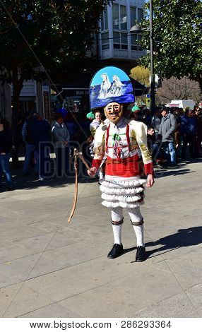 Verin, Spain, 24 Feb 2019. Famous Carnival And Street Parade With Cigarrons Costumes. Ourense Provin