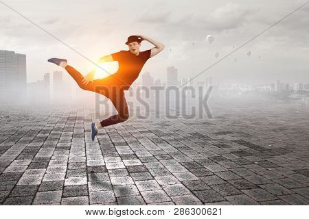 Dance is his world . Mixed media