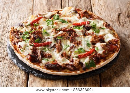 Barbecue Pulled Pork Pizza With Cheese, Pepper And Sauce Close-up. Horizontal
