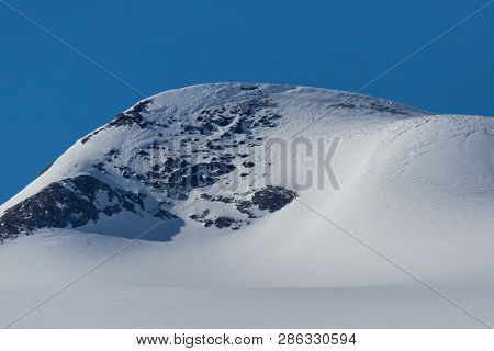 Snowcapped Wildstrubel Mountain In Winter In Swiss Alps, Blue Sky, Sunshine