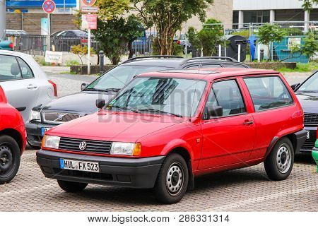 Berlin, Germany - September 10, 2013: Red Motor Car Volkswagen Polo In The City Street.