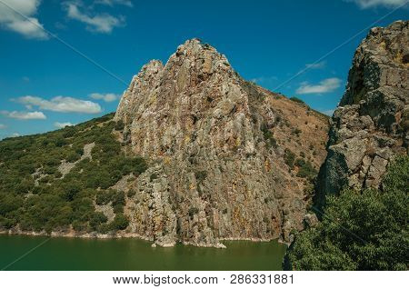Valley With Cliffs And The Tagus River At The Monfrague National Park