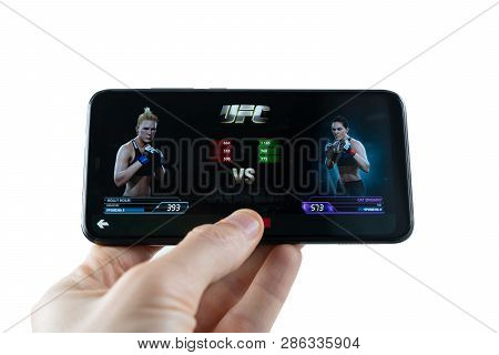 Sochi, Russia-february 24, 2019: A Man Is Playing In Ea Sports Ufc Game On Smartphone