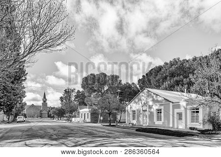 Loxton, South Africa, August 7, 2018: A Street Scene, With The Dutch Reformed Church, In Loxton In T