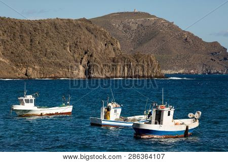 Fishing boats in La Isleta del Moro harbour, Andalusia, Spain