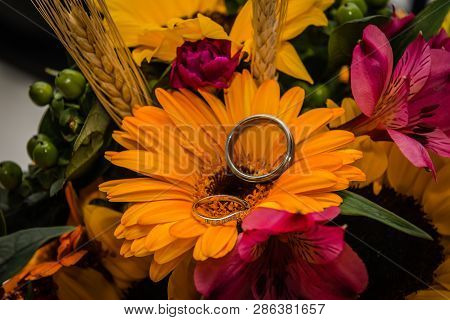Wedding Bouquet With Wedding Rings On Top