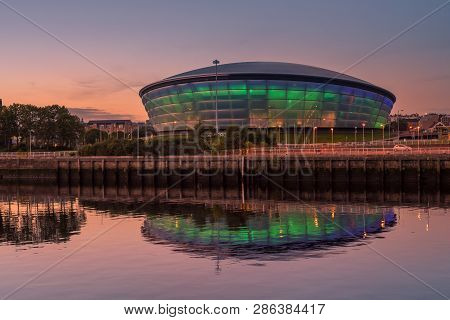 Glasgow/scotland - September 20 2016: The Sse Hydro Lit Up In Blue And Green And Reflected In The Cl