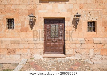 Small Door With Lanterns In Ancient Building