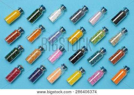Colored Beads In Special Glass Jars. Female Or Kids Hobby