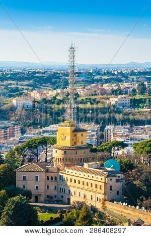 Radio Vaticana Administration Building And Radio Masts At Vatican City