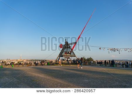 Prague, Czech Republic - May 21, 2018: Prague Metronome In Letna Park With People Relaxing, Czech Re
