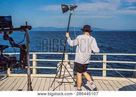 Gaffer Or The Chief Electrician In A Motion-picture Or Television Production Unit Set Up The Lights 