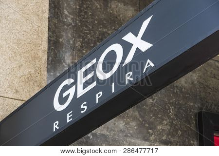 Milan, Italy - 2 June, 2018: Logo Of The Geox Store On The Street Of Milan In Italy.