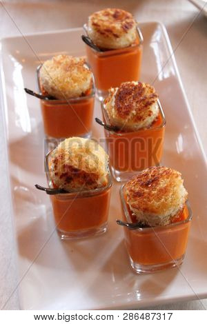 Simple White Serving Platter With Five Small Servings Of Hot Tomato Soup Topped With Fresh-baked Cro