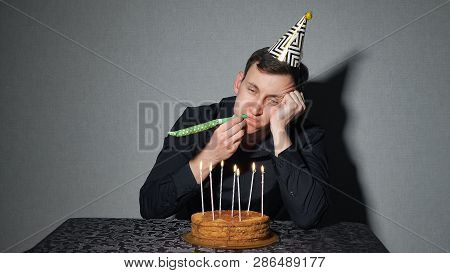 Sad Lonely Man In Party Hat Celebrating Birthday Alone, Depression, Crisis.