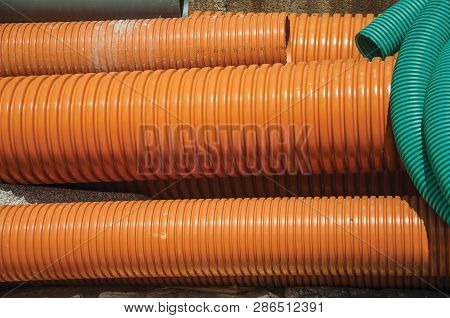 Colorful Plastic Pipes For Electrical Wiring Or Cables On A Construction Site, In A Sunny Day At Avi