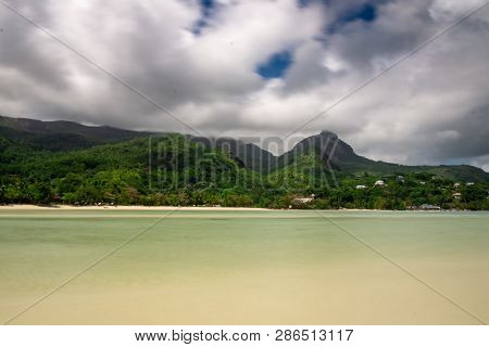 View On Low Tide In A Lagoon Of Mahe Island, Seychelles. Long Exposure Effect.