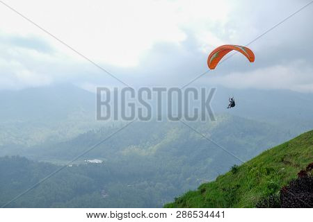 Sky Ricing By Paragliding In Batu Malang, East Java, Indonesia.