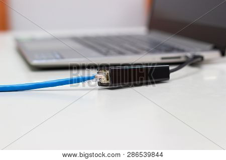 Blue Cat 6e Utp Cable Connect To Port Usb  (device Usb To Lan) Concept Device Technology