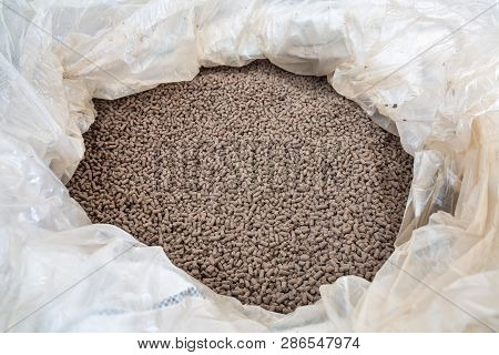 Pellets From Bird Droppings To Fertilize The Soil